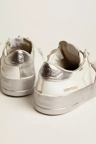 Adidași Stardan cu stea din piele metalică argintie și bandă la călcâi Adidași Stardan cu stea din piele metalică argintie și bandă la călcâi