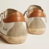 Adidași Super-Star pentru femei, cu stea din piele de căprioară și talpă maro Adidași Super-Star pentru femei, cu stea din piele de căprioară și talpă maro