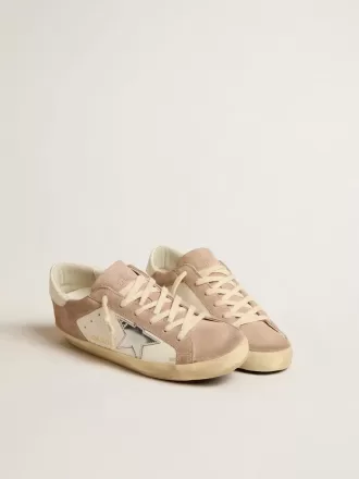 Adidași Super-Star pentru femei din piele de căprioară roz cu stea din piele metalică argintie Adidași Super-Star pentru femei din piele de căprioară roz cu stea din piele metalică argintie