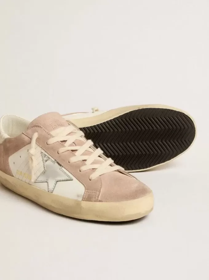 Adidași Super-Star pentru femei din piele de căprioară roz cu stea din piele metalică argintie Adidași Super-Star pentru femei din piele de căprioară roz cu stea din piele metalică argintie