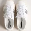 Adidași sustenabili Yatay Model 1B cu parte superioară albă pe bază biologică și sclipici argintiu reciclat Y Adidași sustenabili Yatay Model 1B cu parte superioară albă pe bază biologică și sclipici argintiu reciclat Y