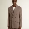 Blazer bărbătesc bej din amestec de lână, cu două rânduri de nasturi Blazer bărbătesc bej din amestec de lână, cu două rânduri de nasturi