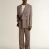 Blazer bărbătesc bej din amestec de lână, cu două rânduri de nasturi Blazer bărbătesc bej din amestec de lână, cu două rânduri de nasturi