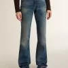 Blugi bootcut pentru femei, cu spălare vintage și detalii metalice Blugi bootcut pentru femei, cu spălare vintage și detalii metalice