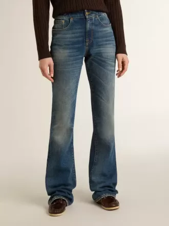Blugi bootcut pentru femei, cu spălare vintage și detalii metalice