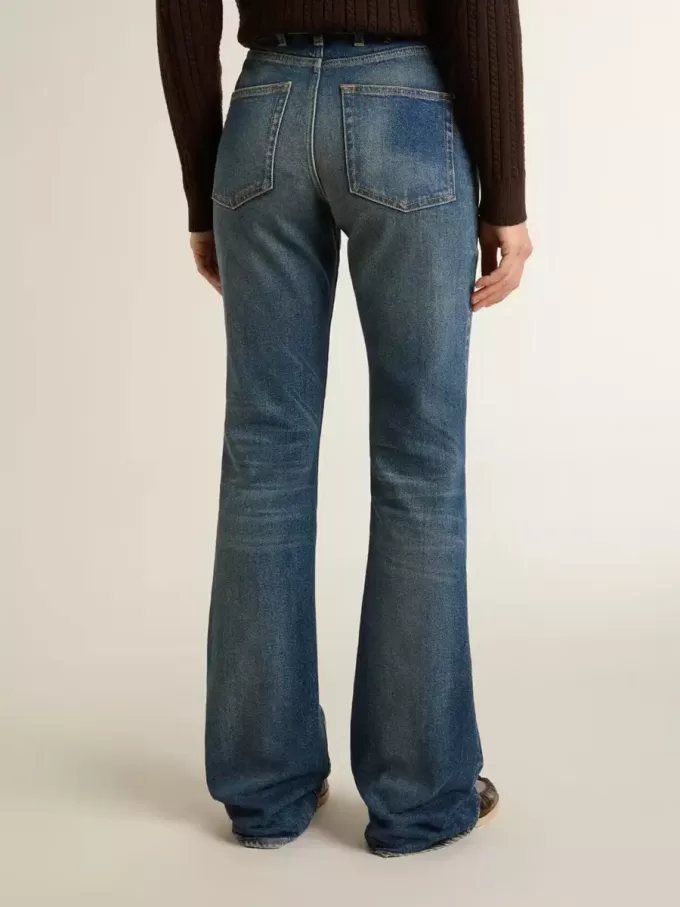 Blugi bootcut pentru femei, cu spălare vintage și detalii metalice Blugi bootcut pentru femei, cu spălare vintage și detalii metalice