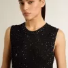 Bluză din tricot negru cu paiete și detalii contrastante Bluză din tricot negru cu paiete și detalii contrastante