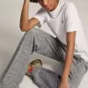 Colecția White Star Tricou cu stea aurie strălucitoare pe partea din față Colecția White Star Tricou cu stea aurie strălucitoare pe partea din față