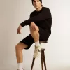 Hanorac negru din colecția Archibald Star, cu stea ton pe ton pe partea din față Hanorac negru din colecția Archibald Star, cu stea ton pe ton pe partea din față
