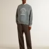 Hanorac oversized în culoarea albastru deschis, cu finisaj uzat Hanorac oversized în culoarea albastru deschis, cu finisaj uzat