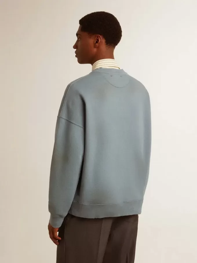 Hanorac oversized în culoarea albastru deschis, cu finisaj uzat Hanorac oversized în culoarea albastru deschis, cu finisaj uzat