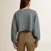 Hanorac scurt, de culoare albastru deschis, cu finisaj uzat Hanorac scurt, de culoare albastru deschis, cu finisaj uzat