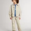 Jacheta bej pentru copii cu pete multicolore