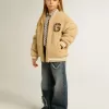 Jacheta bomber din fleece bej pentru copii