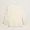 Jacheta oversize cu un singur rând de nasturi, de culoare albă, cu efect de mătase și broderie
