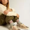 Junior Super-Star cu sclipici, stea din piele întoarsă și bandă la călcâi Junior Super-Star cu sclipici, stea din piele întoarsă și bandă la călcâi
