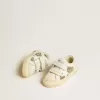 May Teen din piele albă și sclipici auriu, cu stea din piele albă May Teen din piele albă și sclipici auriu, cu stea din piele albă