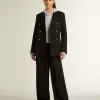 Modelul True-Star pentru femei, din piele de căprioară roz pastel, cu stea argintie și bandă la călcâi Modelul True-Star pentru femei, din piele de căprioară roz pastel, cu stea argintie și bandă la călcâi