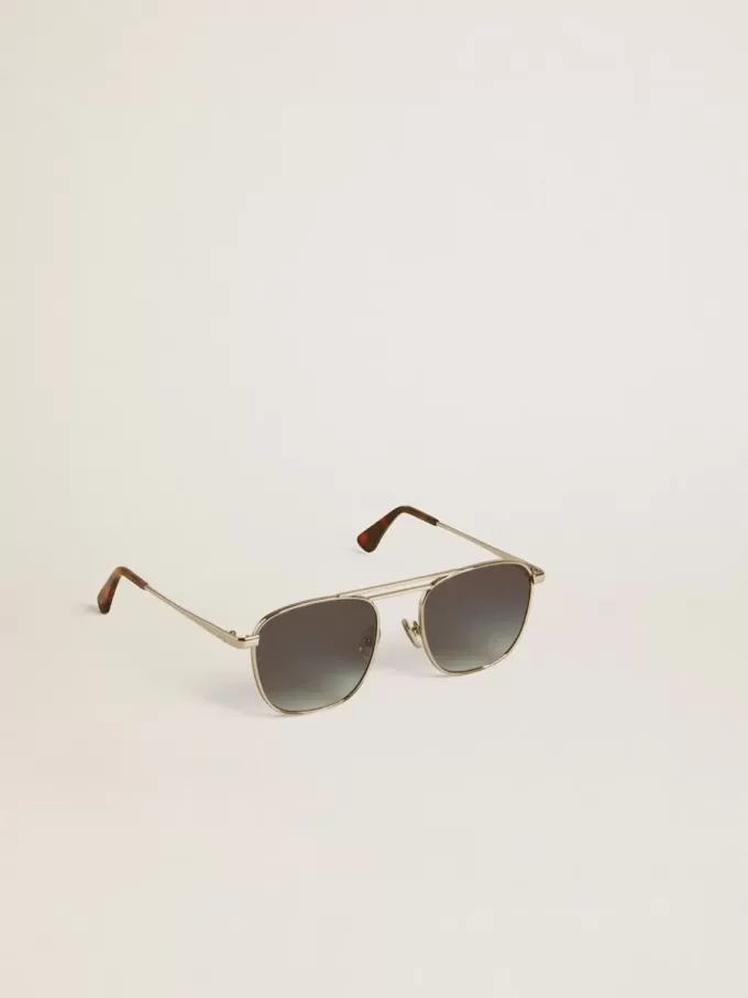 Ochelari de soare în stil aviator, cu ramă argintie și lentile albastre Ochelari de soare în stil aviator, cu ramă argintie și lentile albastre