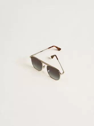 Ochelari de soare în stil aviator, cu ramă argintie și lentile albastre