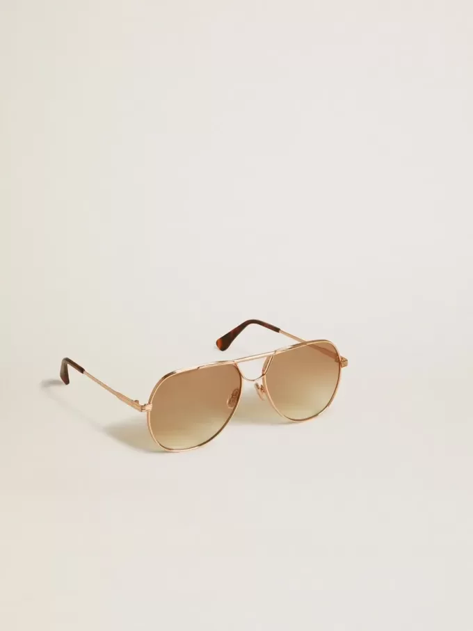 Ochelari de soare în stil aviator, cu ramă roz-auriu și lentile de culoarea mierii Ochelari de soare în stil aviator, cu ramă roz-auriu și lentile de culoarea mierii