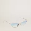 Ochelari de soare în stil cat-eye cu ramă argintie și lentile albastre Ochelari de soare în stil cat-eye cu ramă argintie și lentile albastre