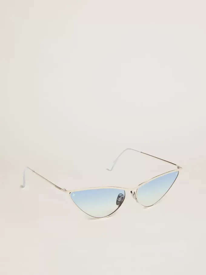 Ochelari de soare în stil cat-eye cu ramă argintie și lentile albastre Ochelari de soare în stil cat-eye cu ramă argintie și lentile albastre