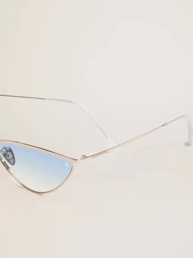 Ochelari de soare în stil cat-eye cu ramă argintie și lentile albastre Ochelari de soare în stil cat-eye cu ramă argintie și lentile albastre