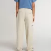Pantaloni chino bej pentru copii, cu pete multicolore