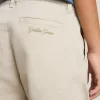 Pantaloni chino bej pentru copii, cu pete multicolore
