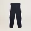 Pantaloni de jogging albastru închis cu dungă albă și stele contrastante Pantaloni de jogging albastru închis cu dungă albă și stele contrastante