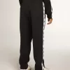 Pantaloni de jogging albastru închis cu dungă albă și stele contrastante Pantaloni de jogging albastru închis cu dungă albă și stele contrastante
