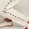 Pantaloni de jogging albi pentru bărbați, cu stele negre pe laterale Pantaloni de jogging albi pentru bărbați, cu stele negre pe laterale
