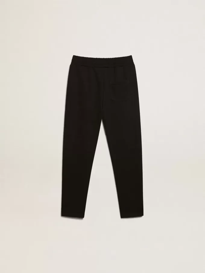 Pantaloni de jogging negri pentru băieți, cu stele albe Pantaloni de jogging negri pentru băieți, cu stele albe