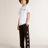 Pantaloni de jogging negri pentru băieți, cu stele albe Pantaloni de jogging negri pentru băieți, cu stele albe