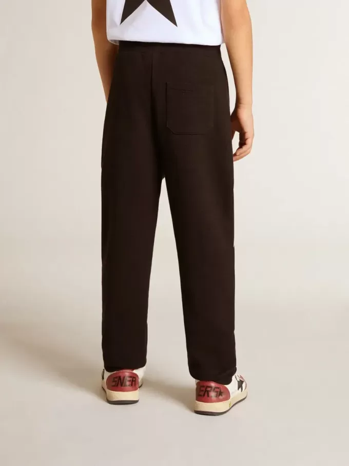 Pantaloni de jogging negri pentru băieți, cu stele albe Pantaloni de jogging negri pentru băieți, cu stele albe