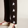 Pantaloni de jogging negri pentru băieți, cu stele albe Pantaloni de jogging negri pentru băieți, cu stele albe