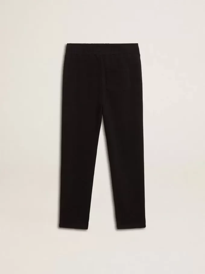 Pantaloni de jogging negri pentru băieți, cu stele albe Pantaloni de jogging negri pentru băieți, cu stele albe