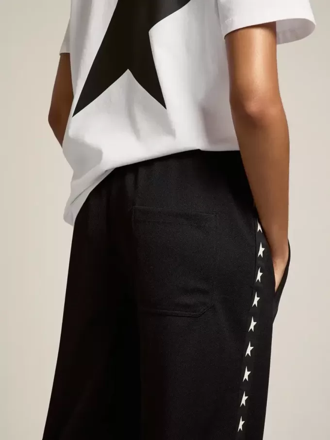 Pantaloni de jogging negri pentru femei, cu stele albe pe laterale Pantaloni de jogging negri pentru femei, cu stele albe pe laterale