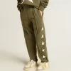 Pantaloni de jogging pentru băieți, de culoare verde militar, cu stele albe Pantaloni de jogging pentru băieți, de culoare verde militar, cu stele albe