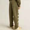 Pantaloni de jogging pentru băieți, de culoare verde militar, cu stele albe Pantaloni de jogging pentru băieți, de culoare verde militar, cu stele albe