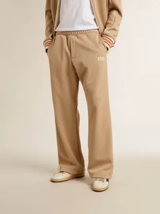 Pantaloni de jogging pentru bărbați, de culoare bej deschis, cu logo alb