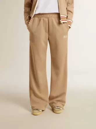 Pantaloni de jogging pentru femei, de culoare bej deschis, cu logo alb