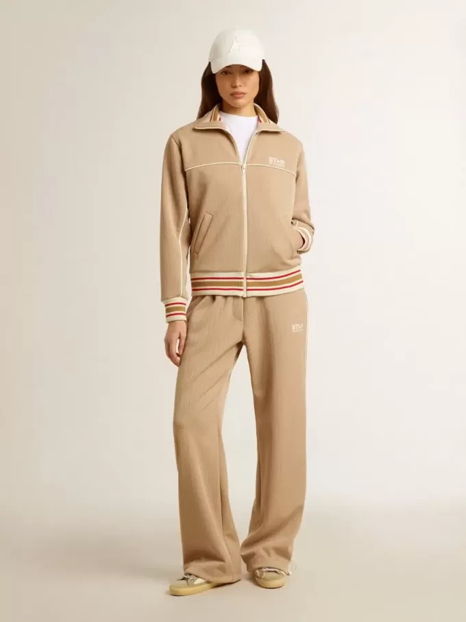 Pantaloni de jogging pentru femei, de culoare bej deschis, cu logo alb Pantaloni de jogging pentru femei, de culoare bej deschis, cu logo alb