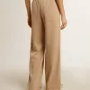 Pantaloni de jogging pentru femei, de culoare bej deschis, cu logo alb Pantaloni de jogging pentru femei, de culoare bej deschis, cu logo alb