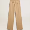 Pantaloni de jogging pentru femei, de culoare bej deschis, cu logo alb Pantaloni de jogging pentru femei, de culoare bej deschis, cu logo alb