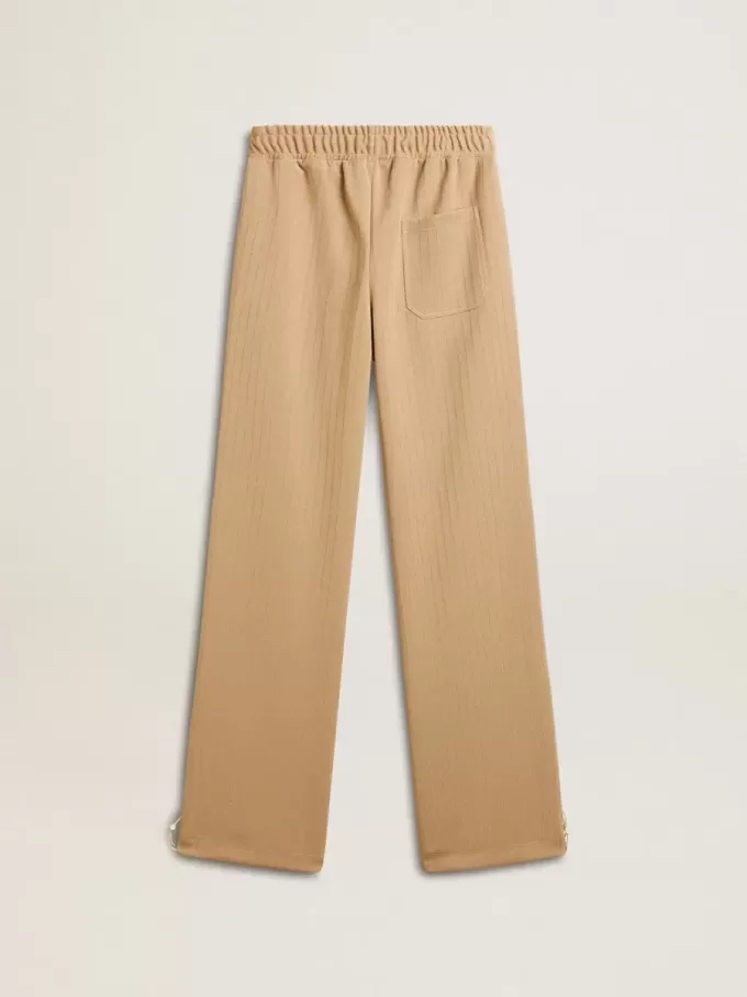Pantaloni de jogging pentru femei, de culoare bej deschis, cu logo alb Pantaloni de jogging pentru femei, de culoare bej deschis, cu logo alb