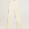 Pantaloni largi pentru femei din țesătură albă uzată Pantaloni largi pentru femei din țesătură albă uzată