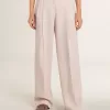Pantaloni pentru femei din țesătură de lână roz, croiți pe măsură Pantaloni pentru femei din țesătură de lână roz, croiți pe măsură