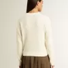 Pulover cu guler rotund pentru femei, din lână merino albă, cu cristale pe toată suprafața Pulover cu guler rotund pentru femei, din lână merino albă, cu cristale pe toată suprafața